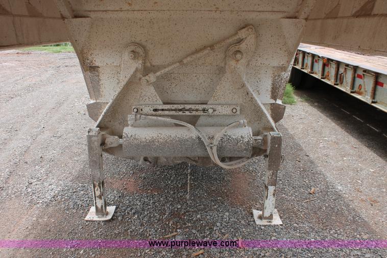 image for item H5641 2007 Construction Trailer Specialist, Inc. BDT-42 triple axle belly dump trailer