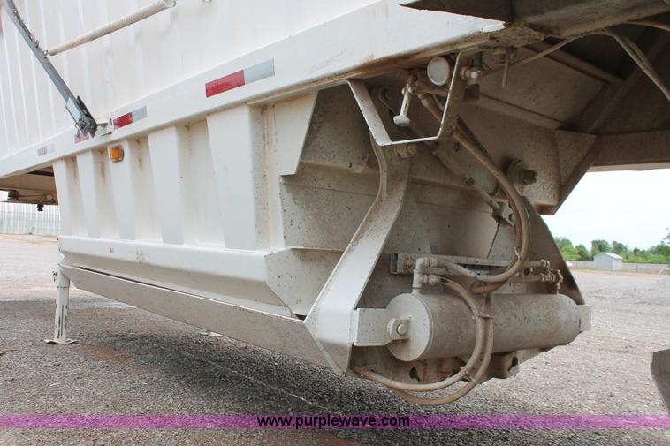 image for item H5641 2007 Construction Trailer Specialist, Inc. BDT-42 triple axle belly dump trailer