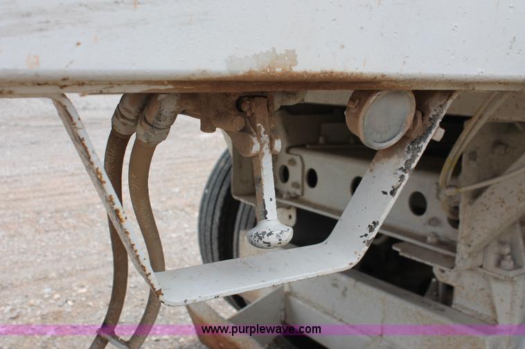 image for item H5641 2007 Construction Trailer Specialist, Inc. BDT-42 triple axle belly dump trailer