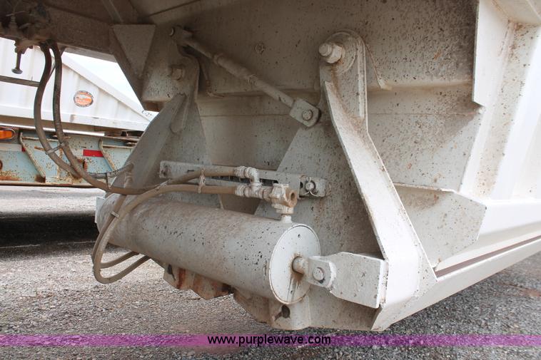 image for item H5641 2007 Construction Trailer Specialist, Inc. BDT-42 triple axle belly dump trailer