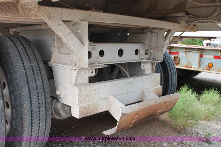 image for item H5641 2007 Construction Trailer Specialist, Inc. BDT-42 triple axle belly dump trailer