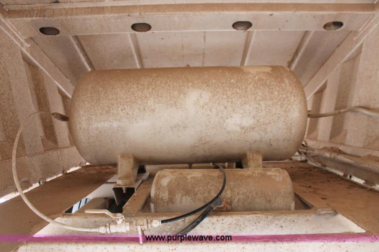 image for item H5641 2007 Construction Trailer Specialist, Inc. BDT-42 triple axle belly dump trailer