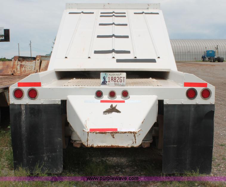 image for item H5641 2007 Construction Trailer Specialist, Inc. BDT-42 triple axle belly dump trailer