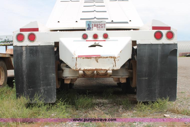 image for item H5641 2007 Construction Trailer Specialist, Inc. BDT-42 triple axle belly dump trailer