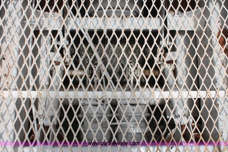 image for item H5641 2007 Construction Trailer Specialist, Inc. BDT-42 triple axle belly dump trailer