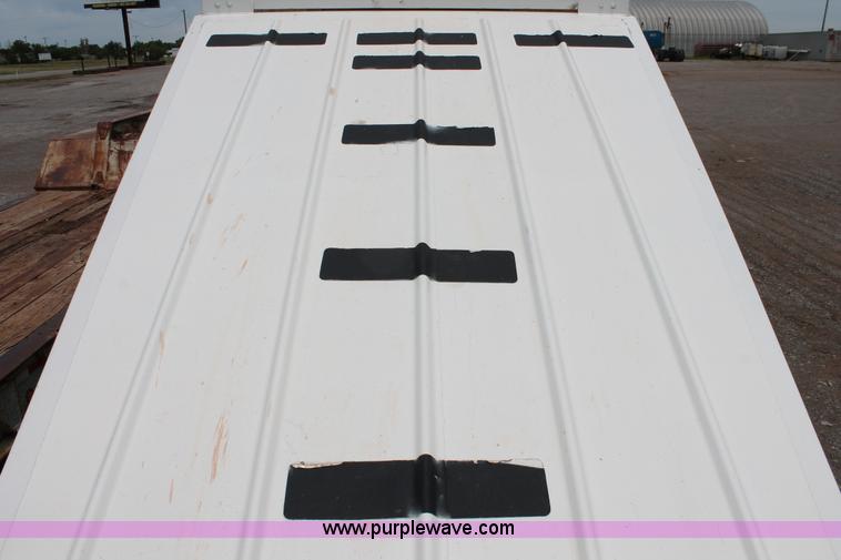 image for item H5641 2007 Construction Trailer Specialist, Inc. BDT-42 triple axle belly dump trailer