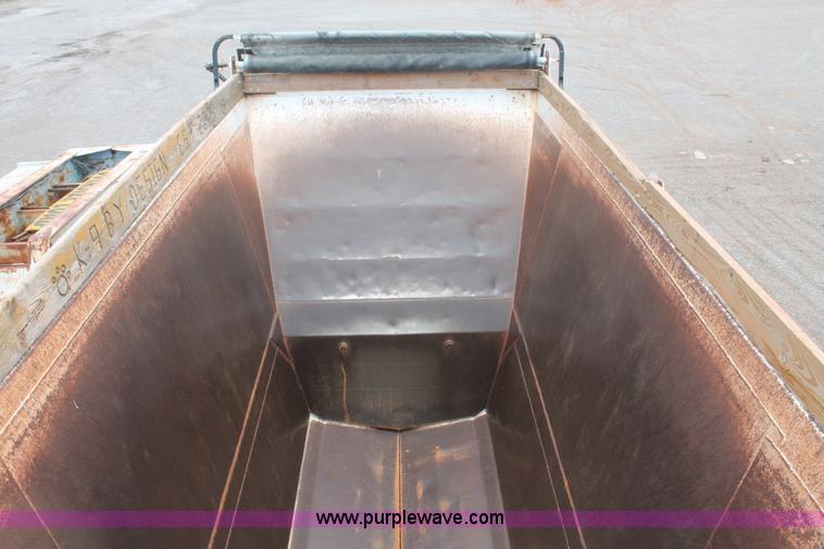 image for item H5641 2007 Construction Trailer Specialist, Inc. BDT-42 triple axle belly dump trailer