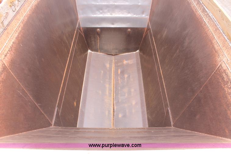 image for item H5641 2007 Construction Trailer Specialist, Inc. BDT-42 triple axle belly dump trailer