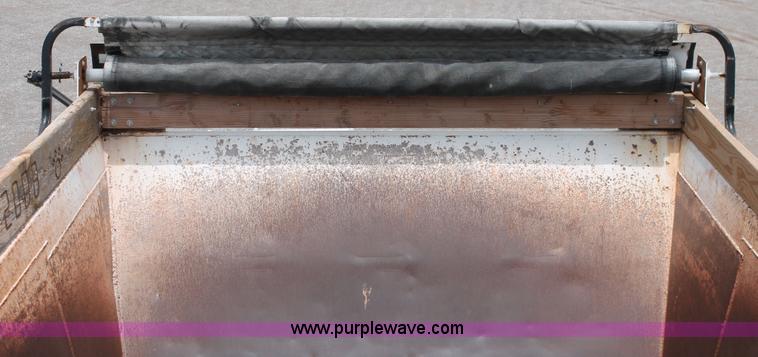 image for item H5641 2007 Construction Trailer Specialist, Inc. BDT-42 triple axle belly dump trailer