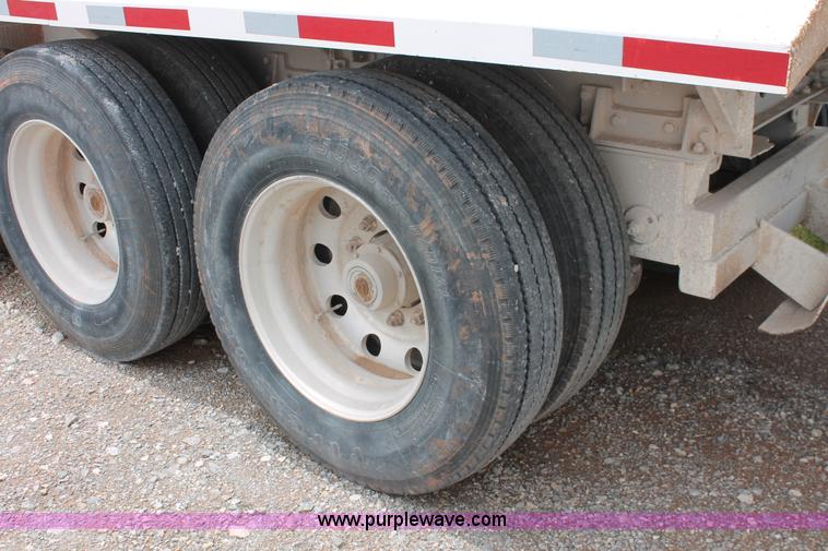 image for item H5641 2007 Construction Trailer Specialist, Inc. BDT-42 triple axle belly dump trailer