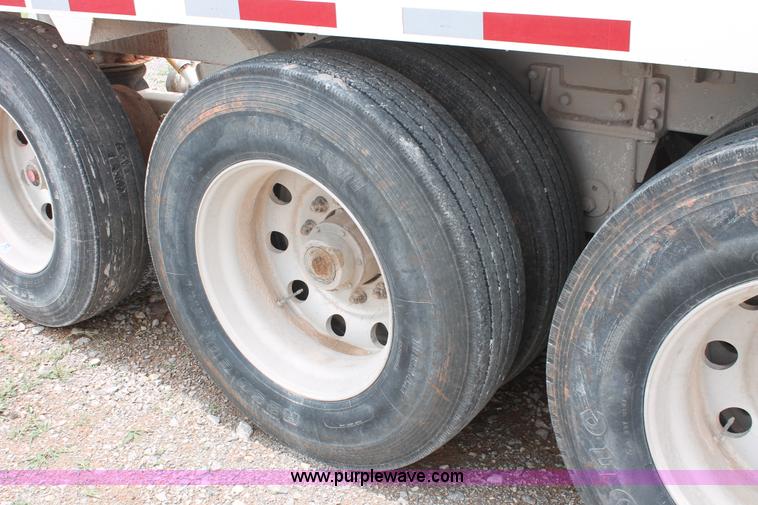 image for item H5641 2007 Construction Trailer Specialist, Inc. BDT-42 triple axle belly dump trailer