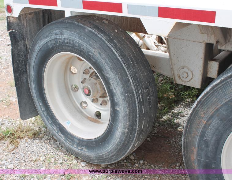 image for item H5641 2007 Construction Trailer Specialist, Inc. BDT-42 triple axle belly dump trailer