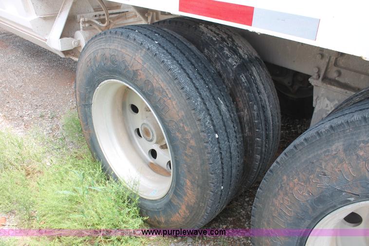 image for item H5641 2007 Construction Trailer Specialist, Inc. BDT-42 triple axle belly dump trailer