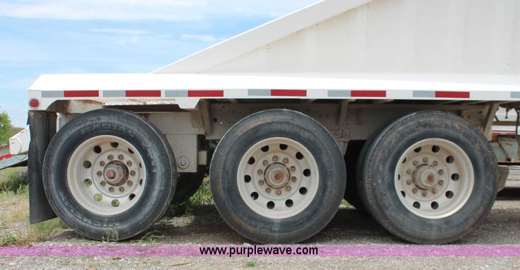 image for item H5641 2007 Construction Trailer Specialist, Inc. BDT-42 triple axle belly dump trailer