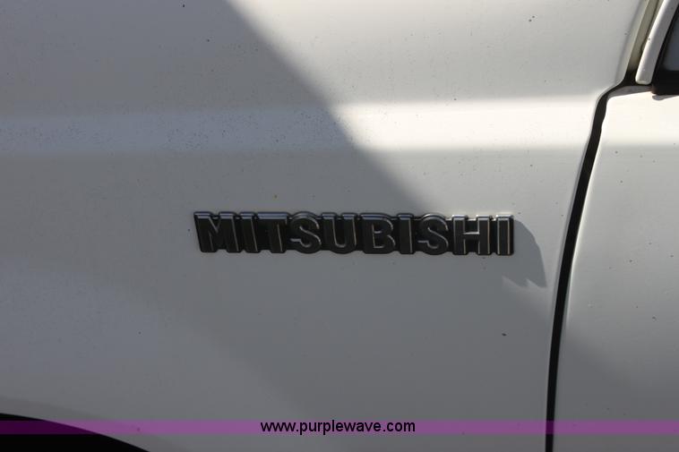 image for item I7290 1991 Mitsubishi Mighty Max Macrocab pickup truck
