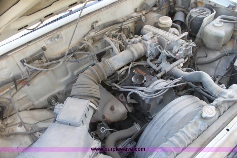 image for item I7290 1991 Mitsubishi Mighty Max Macrocab pickup truck