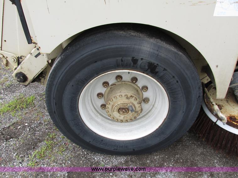 image for item J1070 1998 Elgin Pelican P series street sweeper