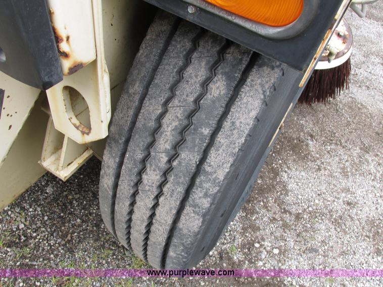 image for item J1070 1998 Elgin Pelican P series street sweeper