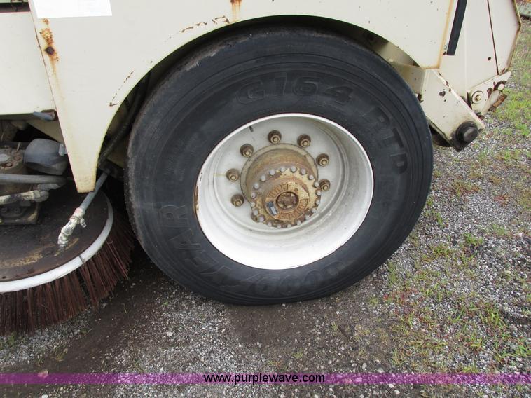 image for item J1070 1998 Elgin Pelican P series street sweeper