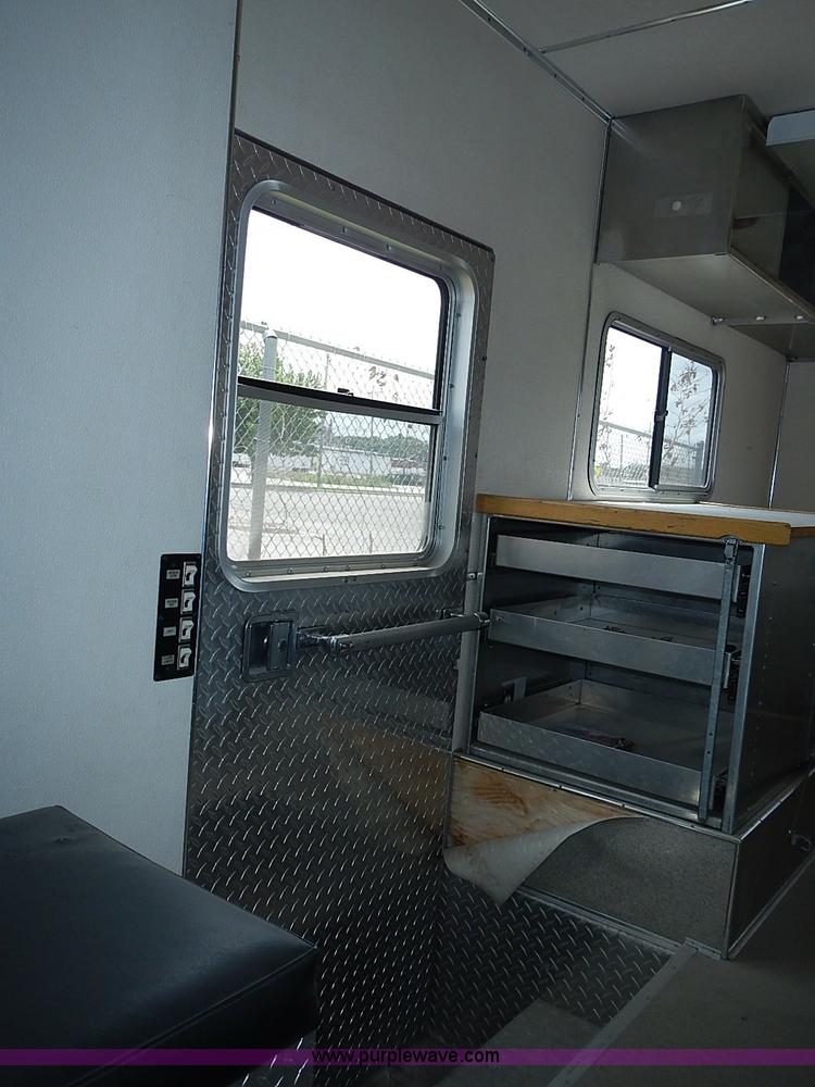 image for item J1231 1995 Freightliner FL70 Emergency truck