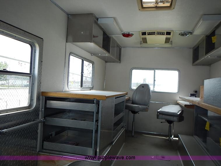 image for item J1231 1995 Freightliner FL70 Emergency truck