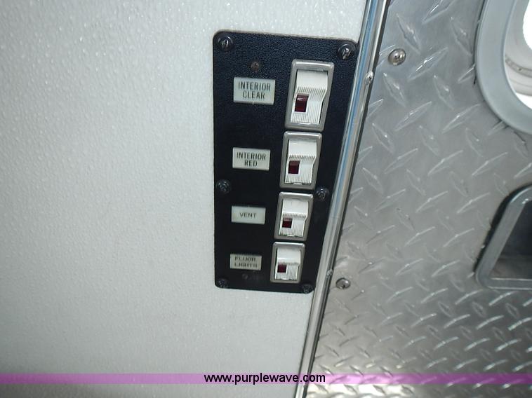 image for item J1231 1995 Freightliner FL70 Emergency truck