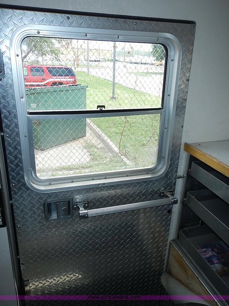 image for item J1231 1995 Freightliner FL70 Emergency truck