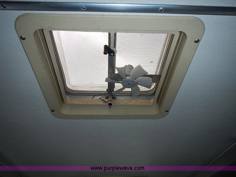 image for item J1231 1995 Freightliner FL70 Emergency truck