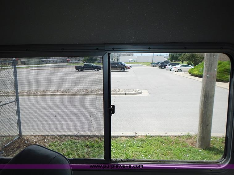 image for item J1231 1995 Freightliner FL70 Emergency truck