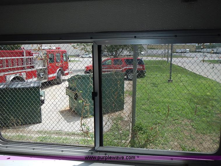 image for item J1231 1995 Freightliner FL70 Emergency truck