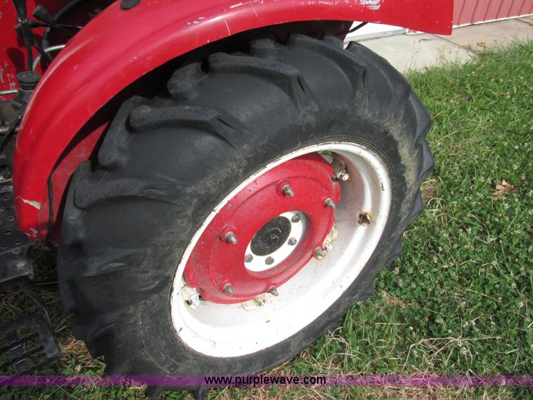 image for item AN9003 2006 Farm Pro 2425 MFWD tractor