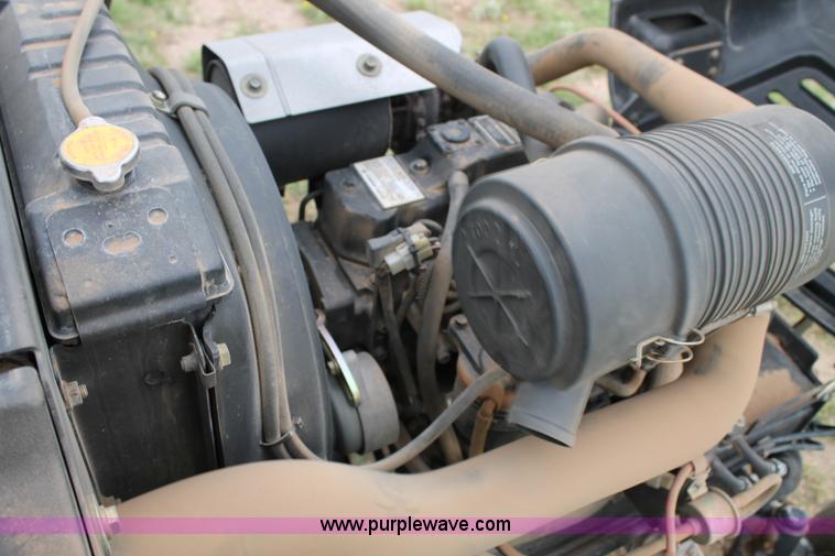 image for item C3933 John Deere 3245C gang mower