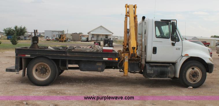 image for item C3934 2003 International DuraStar 4300 flatbed truck with crane