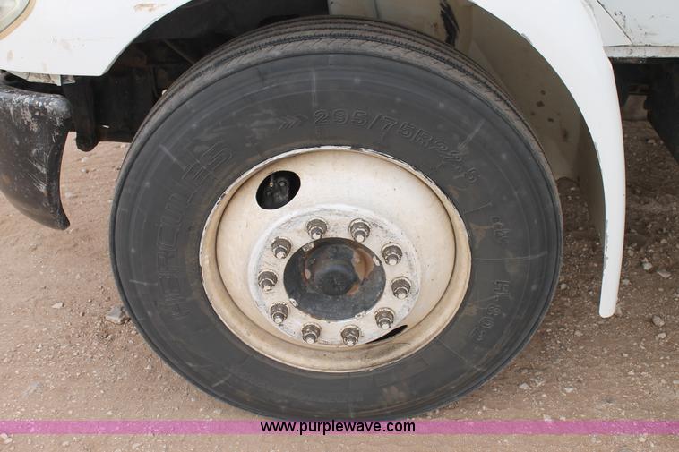 image for item C3934 2003 International DuraStar 4300 flatbed truck with crane