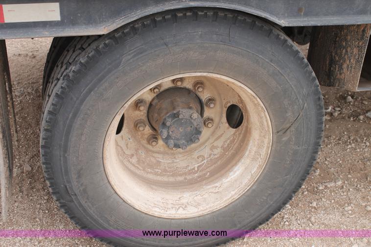 image for item C3934 2003 International DuraStar 4300 flatbed truck with crane