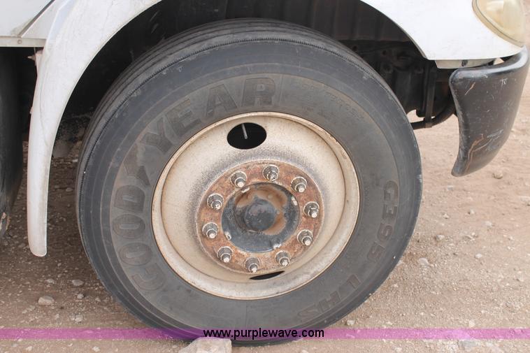 image for item C3934 2003 International DuraStar 4300 flatbed truck with crane