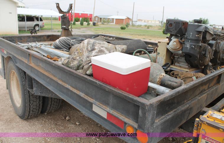 image for item C3934 2003 International DuraStar 4300 flatbed truck with crane