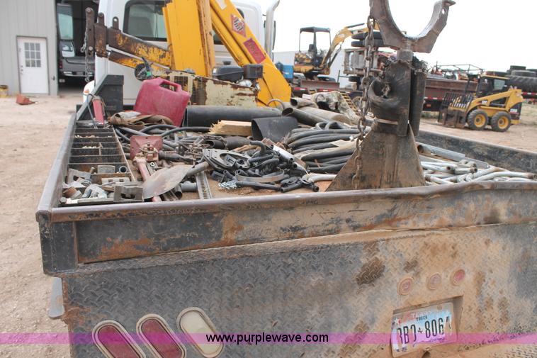 image for item C3934 2003 International DuraStar 4300 flatbed truck with crane