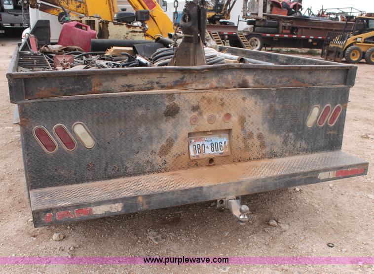 image for item C3934 2003 International DuraStar 4300 flatbed truck with crane