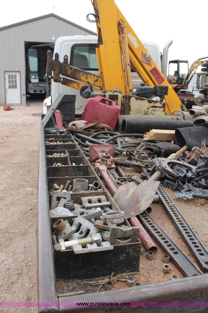 image for item C3934 2003 International DuraStar 4300 flatbed truck with crane