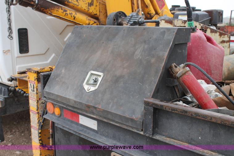 image for item C3934 2003 International DuraStar 4300 flatbed truck with crane