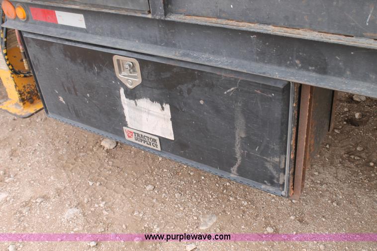 image for item C3934 2003 International DuraStar 4300 flatbed truck with crane