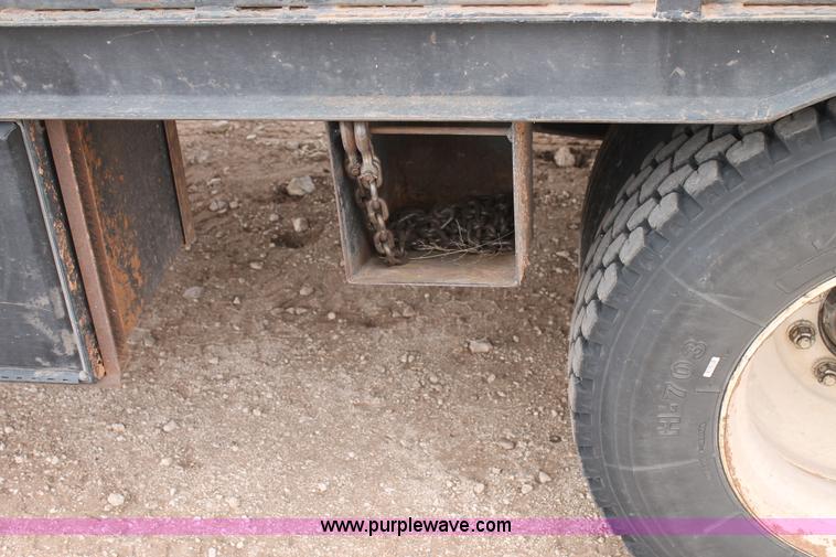 image for item C3934 2003 International DuraStar 4300 flatbed truck with crane