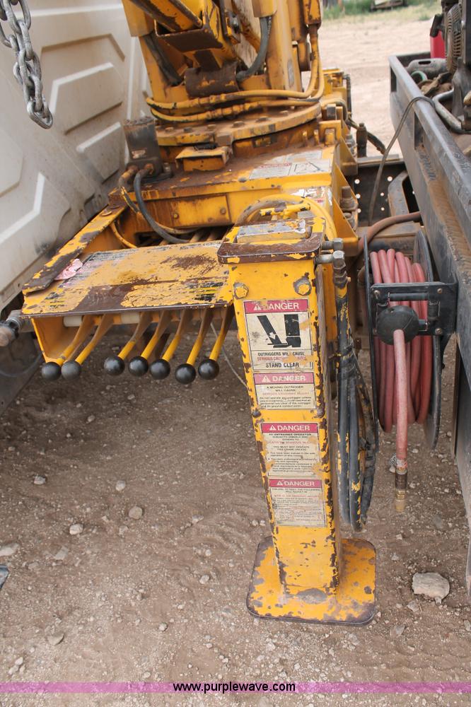 image for item C3934 2003 International DuraStar 4300 flatbed truck with crane