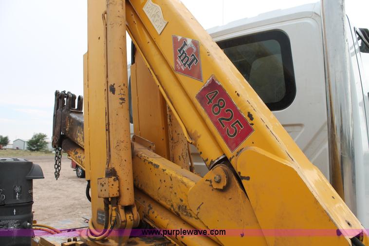 image for item C3934 2003 International DuraStar 4300 flatbed truck with crane