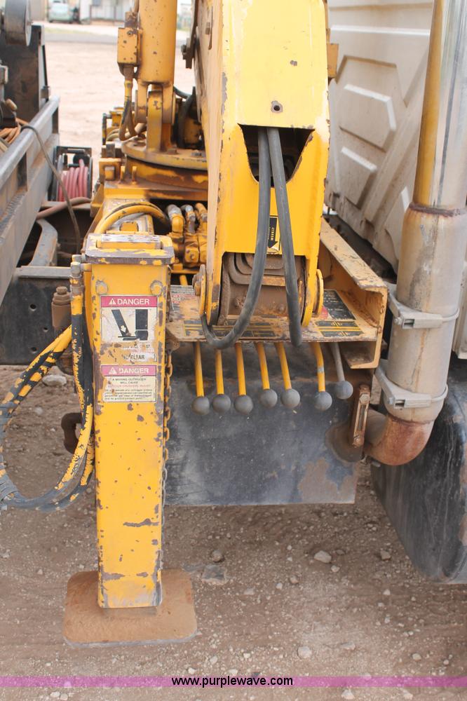 image for item C3934 2003 International DuraStar 4300 flatbed truck with crane