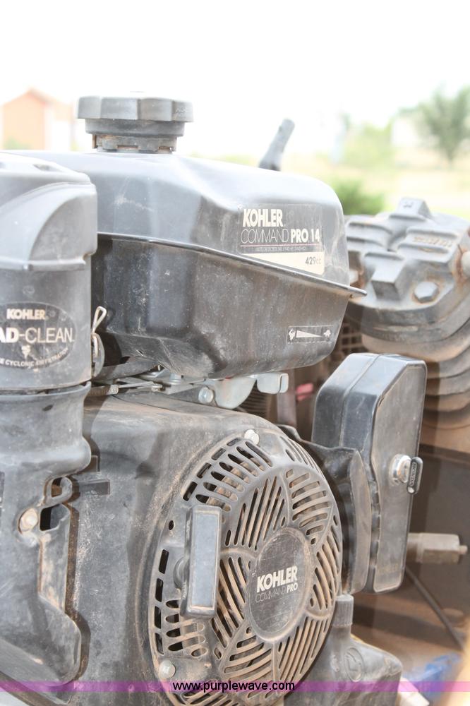 image for item C3934 2003 International DuraStar 4300 flatbed truck with crane