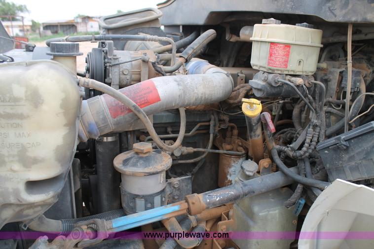 image for item C3934 2003 International DuraStar 4300 flatbed truck with crane