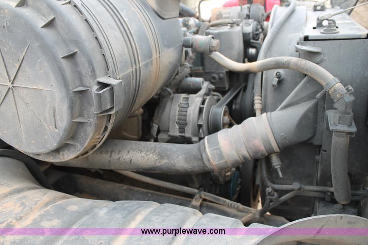 image for item C3934 2003 International DuraStar 4300 flatbed truck with crane