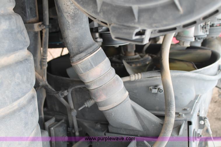 image for item C3934 2003 International DuraStar 4300 flatbed truck with crane